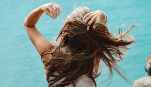 woman holding hair